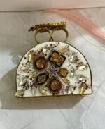 A sophisticated gold clutch with crystal and pearl embellishments, perfect for adding an elegant touch to your formal and evening outfits.