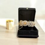 Gold bracelet with citrine stone and crystal embellishments.