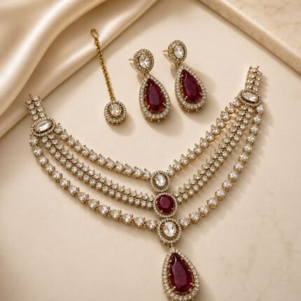 ruby red necklace set with zircon crystals and maang tikka