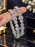 Hassen Karray rhodium plated real AD zircon stones karray pair