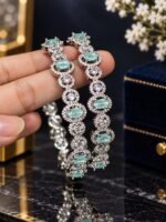 Hassen Karray rhodium plated real AD zircon stones karray pair