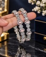 Hassen Karray rhodium plated real AD zircon stones karray pair